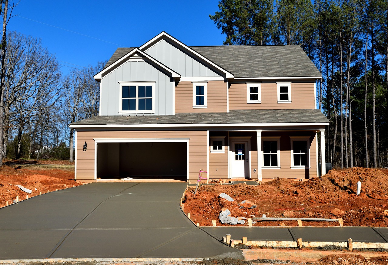 house, family, architecture, suburb, roof, window, home, facade, driveway, wood, porch, door, garage, exterior, outdoors, brick, residential, real estate, luxury home, nature, building, modern, new, construction, sky, front, style, design, grass, property, city, concrete